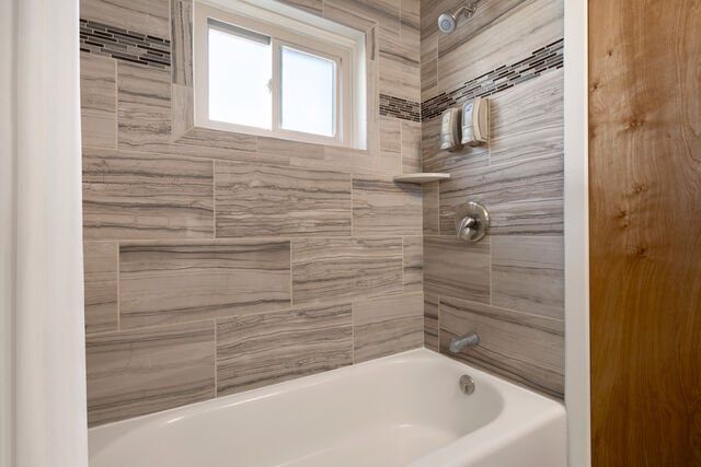 hotel shower in remodeled bathroom