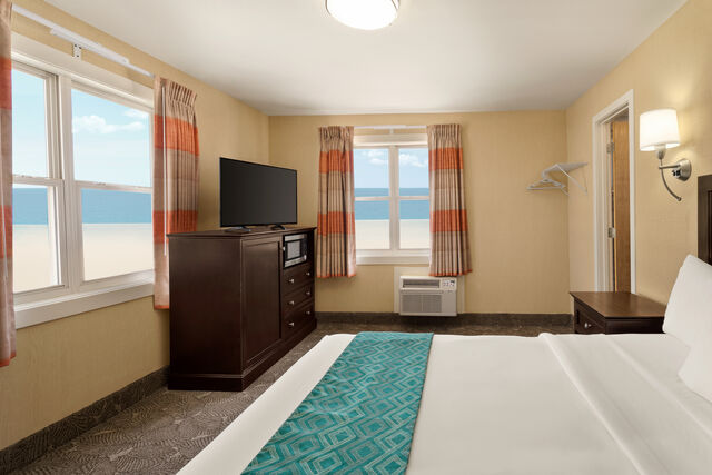 Take in multiple views of the wide beach, Atlantic ocean, and famous Ocean City boardwalk from this Queen Corner Room.